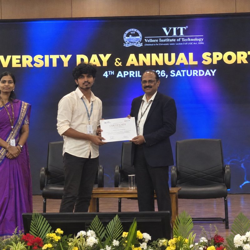 Receiving a certificate at VIT University Day